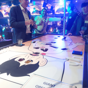 Guests playing Giant Operation Game rental at corporate gala event in New York City