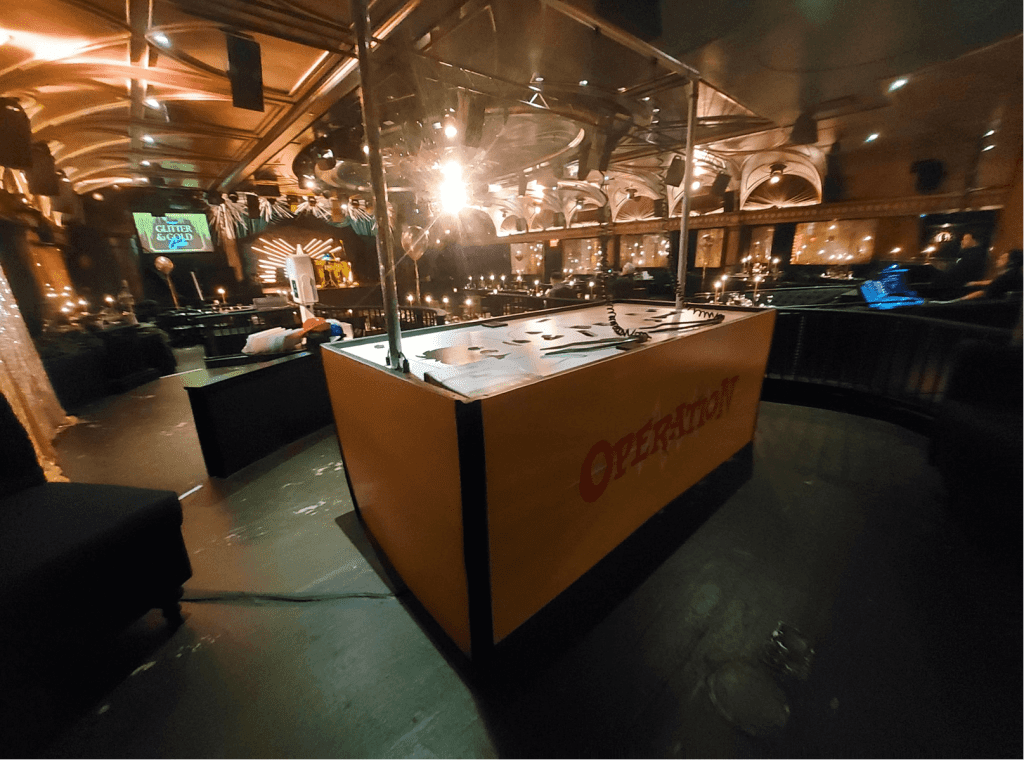 Giant Operation Game rental table setup at New York event venue by CoCo Events