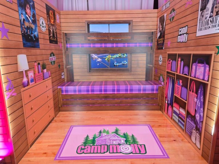 The walk-in cabin: bunks, gear, and a lake-view window.